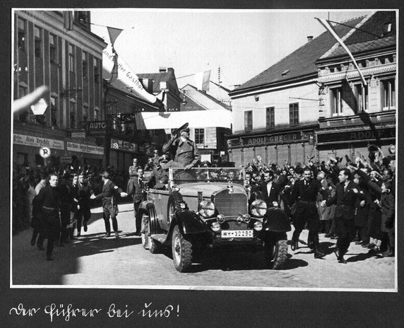 Adolf Hitler drives through Amstetten, Austria